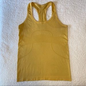 lululemon Swiftly Tech Tank size 6 in yellow/gold